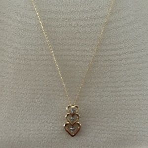 Triple Heart Gold and Diamond Necklace
